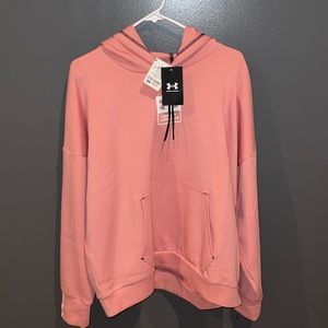 pink under armour sweatshirt, never worn with tags, size XL. oversized
